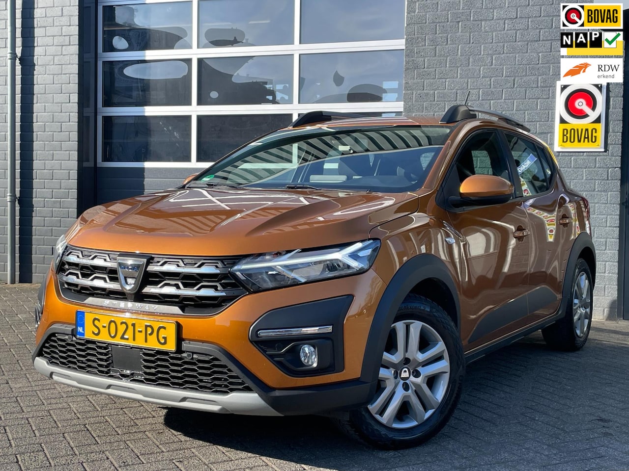 Dacia Sandero Stepway - 1.0 TCe 90 Comfort|TREKHAAK|CAMERA|CRUISE|KEYLESS|AIRCO| - AutoWereld.nl