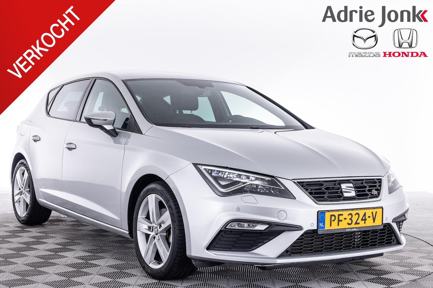 Seat Leon - 1.4 EcoTSI FR | AUTOMAAT | NAVIGATIE | ACHTERUITRIJCAMERA | PARKEERSENSOREN | CLIMATE CONT - AutoWereld.nl