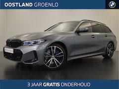 BMW 3-serie Touring - 320i M Sport (incl. 3 jaar gratis onderhoud) / Sportstoelen / Trekhaak / Adaptieve LED / A