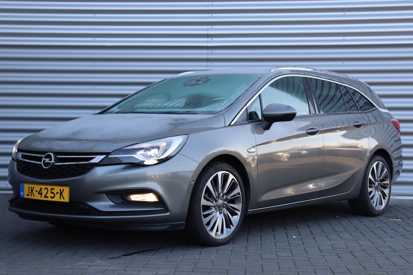 Opel Astra Sports Tourer - 1.4 TURBO 150PK INNOVATION+ / NAVI / LEDER / CLIMA / AGR / PDC / 18" LMV / CAMERA / KEYLES - AutoWereld.nl