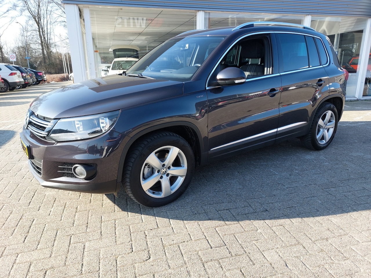 Volkswagen Tiguan - 1.4 TSI Sport&Style - AutoWereld.nl