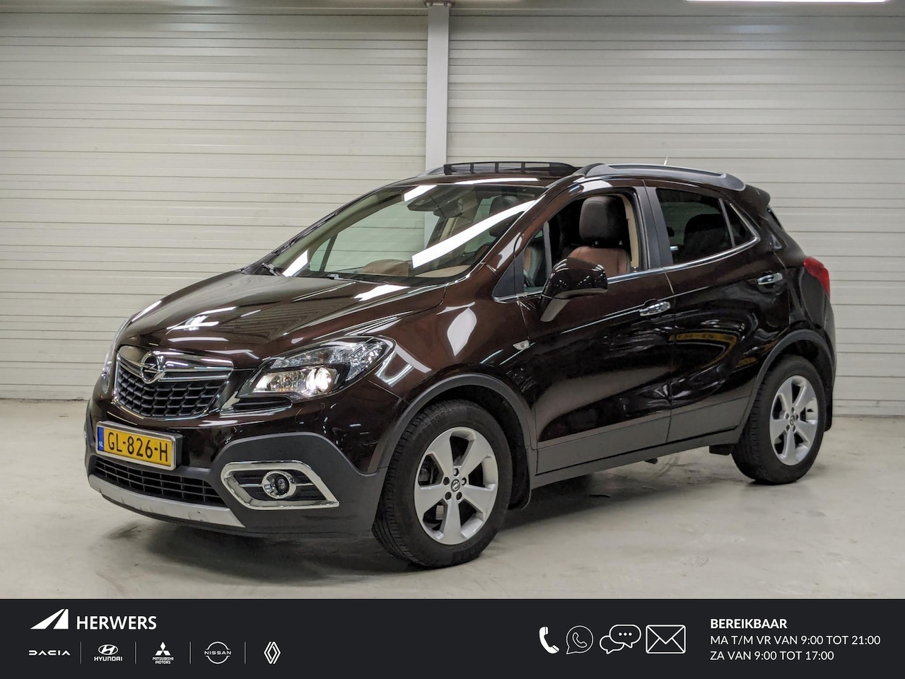 Opel Mokka - 1.4 T Cosmo / Schuif-/Kanteldak / Achteruitrijcamera / Stuur- en Stoelverwarming - AutoWereld.nl