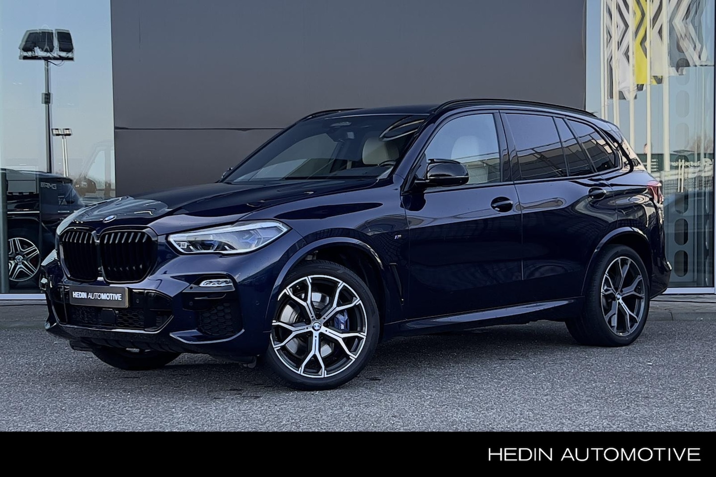 BMW X5 - M50i Automaat High Executive | M Aerodynamica Pakket | H/K Audio | Head-Up | Adaptieve LED - AutoWereld.nl