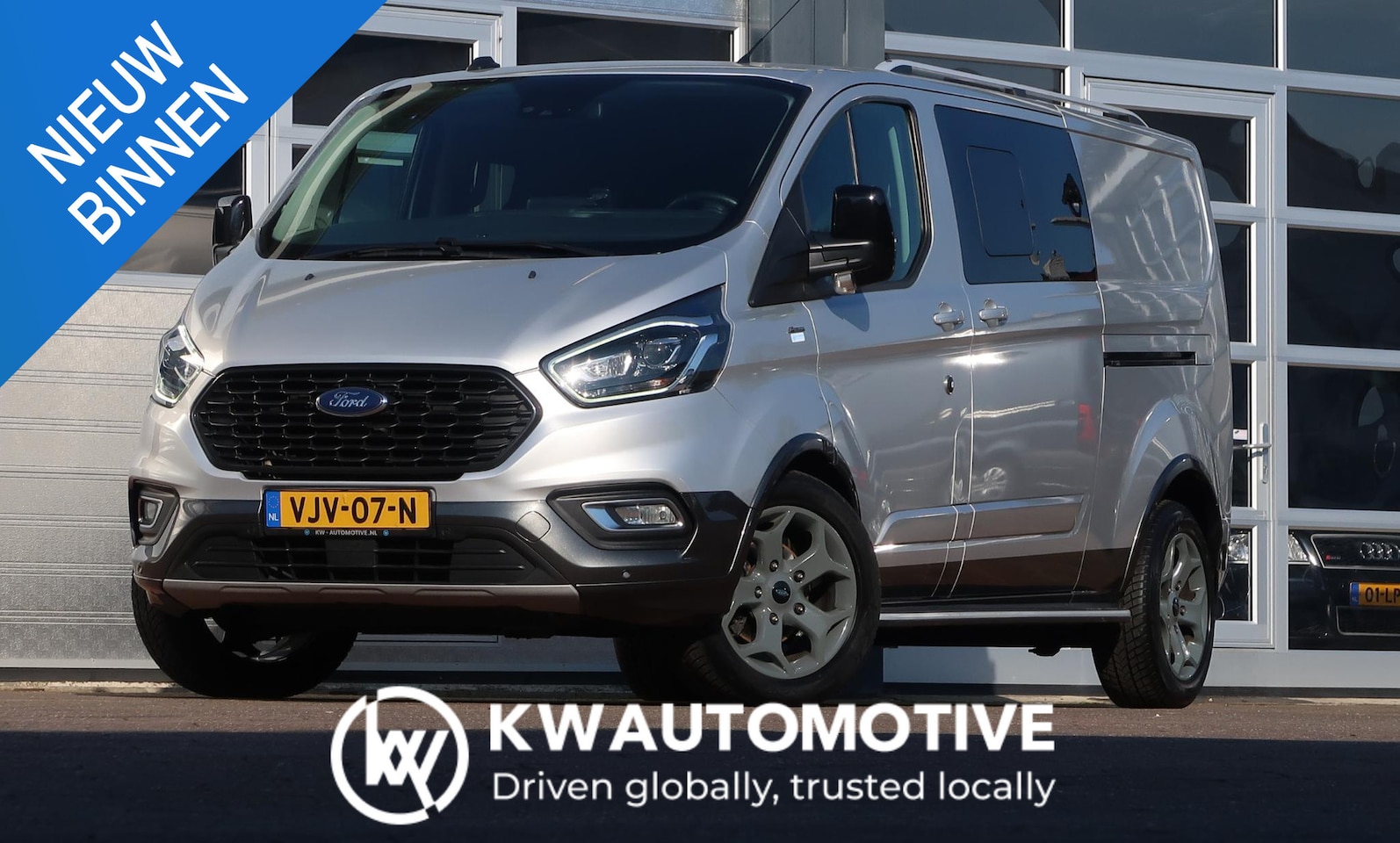 Ford Transit Custom - 320 2.0 TDCI L2H1 DC AUT/ LED/ CAMERA/ ACC/ 2X DEUR/ CLIMA/ TREKHAAK - AutoWereld.nl