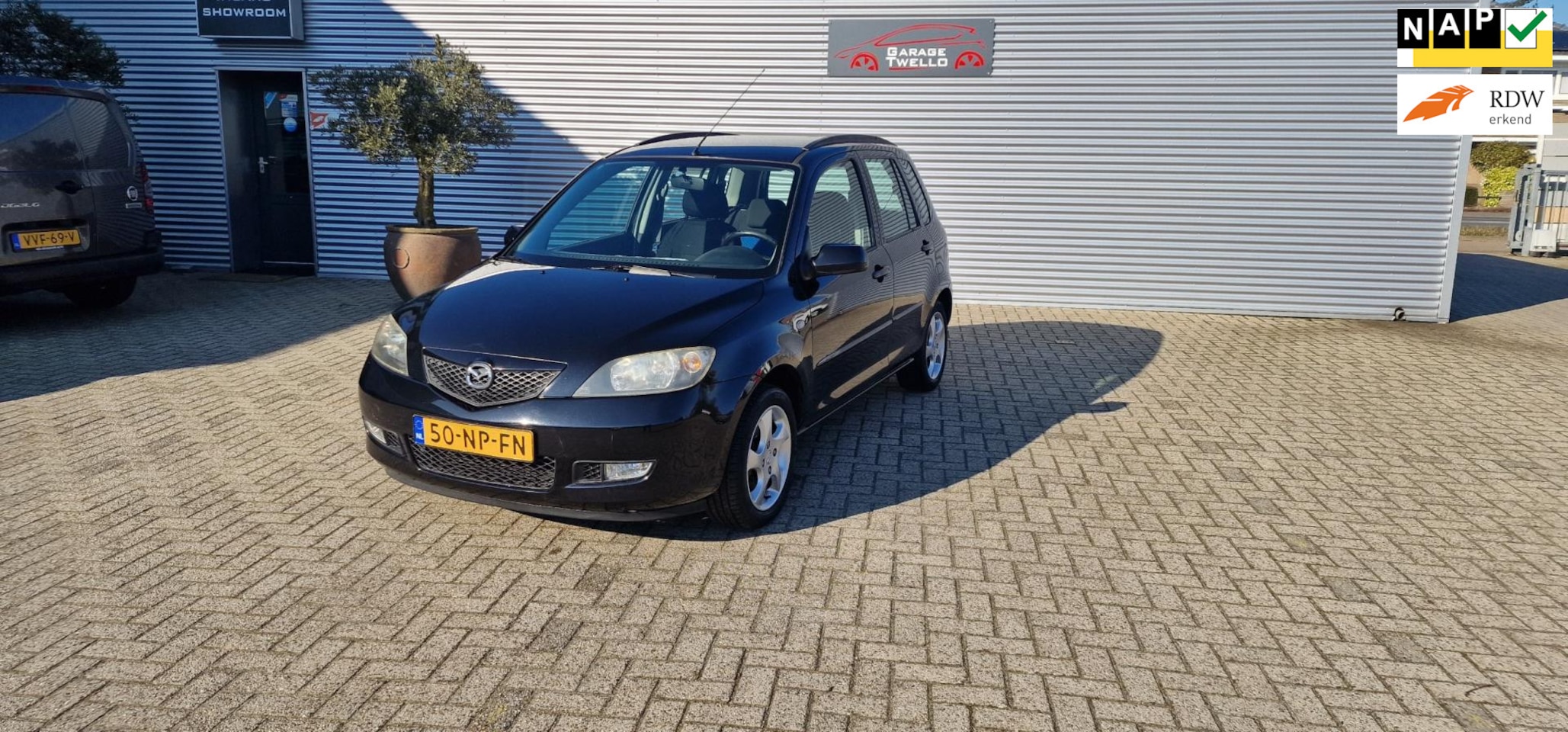 Mazda 2 - 1.4 Touring 1.4 Touring,airco,cv vergrendeling,4xwinterbanden,trekhaak,elektriese ramen,enz,zie fotos - AutoWereld.nl