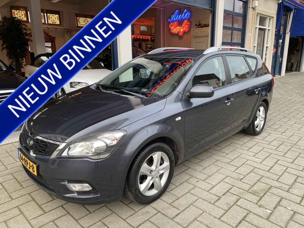 Kia Cee'd Sporty Wagon - 1.4 CVVT Seven NAVI/AIRCO/CRUISE/NAP - AutoWereld.nl