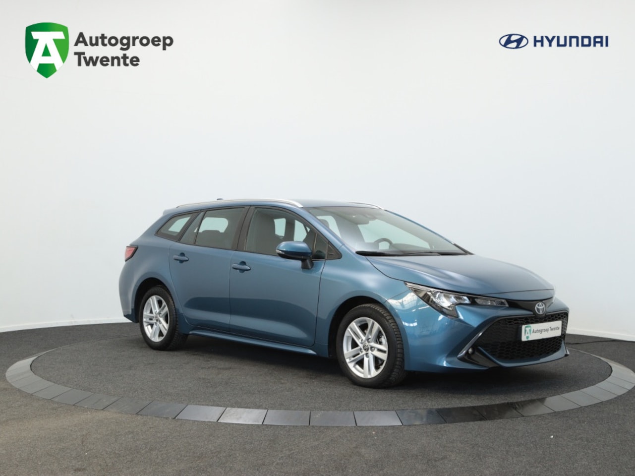 Toyota Corolla Touring Sports - 1.8 Hybrid Dynamic | Navigatie | Business Pack | DAB | - AutoWereld.nl