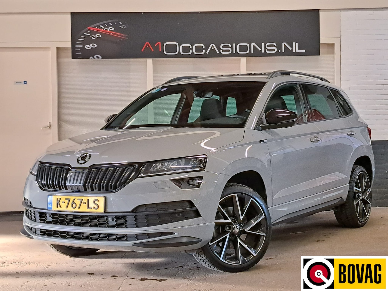 Skoda Karoq - 1.5 TSI ACT Sportline Business + PANODAK + NAVI !! - AutoWereld.nl