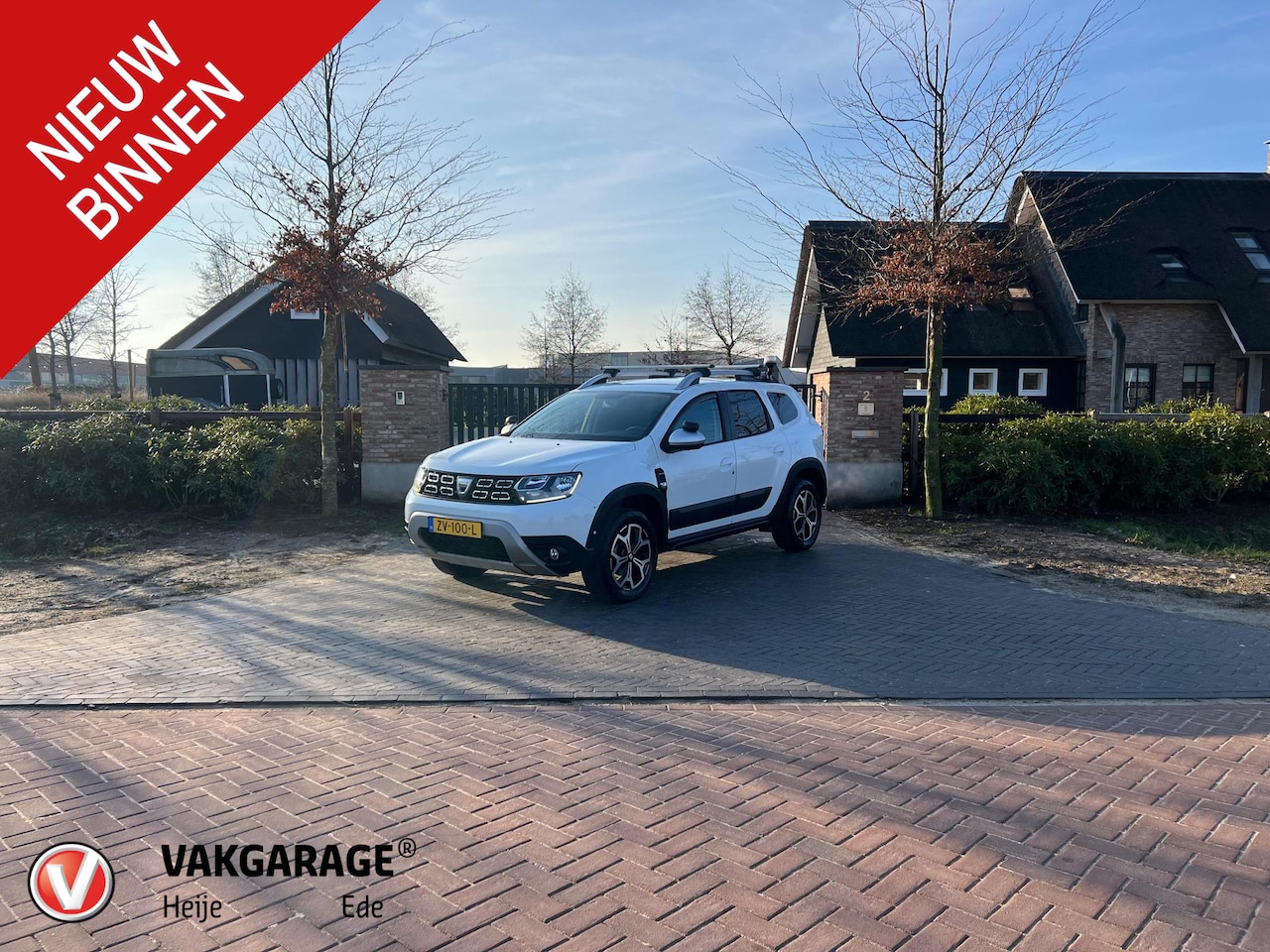 Dacia Duster - 1.6 SCe Prestige | Uniek | Grijs Kenteken | 4X4 | Camera | Trekhaak | Stoelverwarming | - AutoWereld.nl