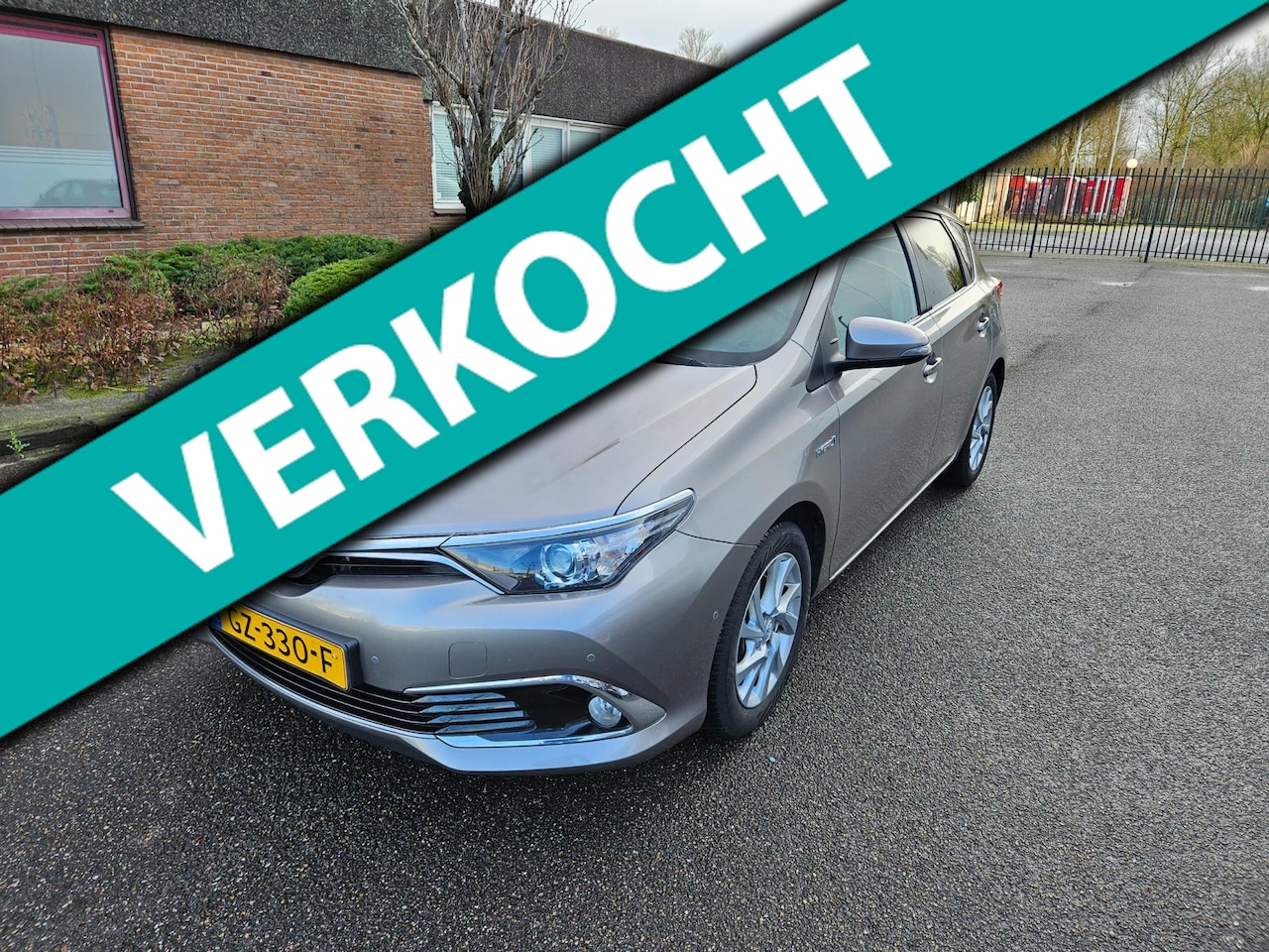 Toyota Auris - 1.8 Hybrid Executive Airco Navi Dab Boekjes Nap - AutoWereld.nl