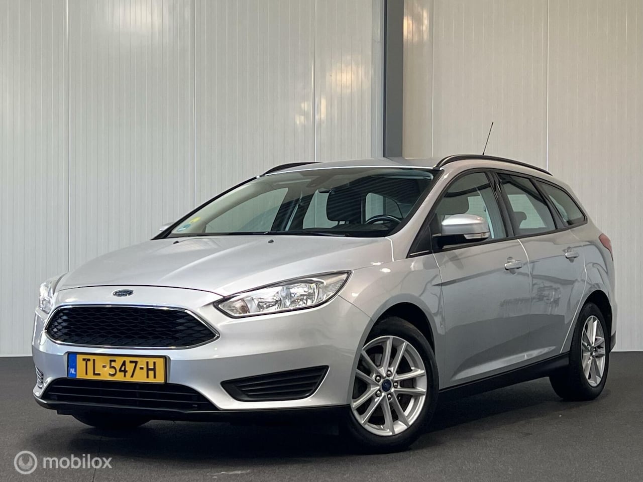 Ford Focus Wagon - 1.5 TDCI Edition [ trekhaak navigatie LM ] - AutoWereld.nl