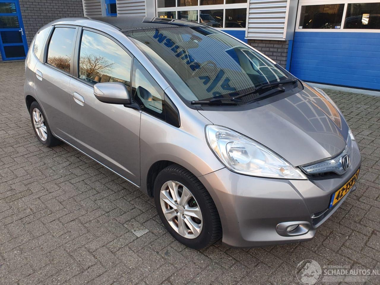 Honda Jazz - 1.4 Hybride elegance - AutoWereld.nl