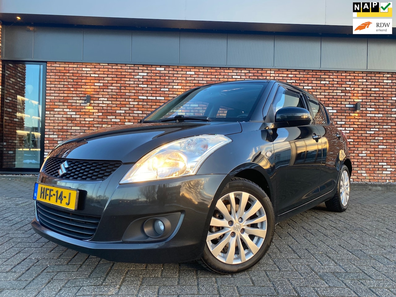 Suzuki Swift - 1.2 Comfort Keyless Cruise Schuifdak 5drs Clima - AutoWereld.nl