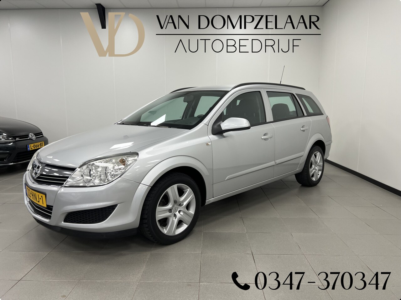 Opel Astra Wagon - 1.4 Business / Airco / Navi / Cruise.C / - AutoWereld.nl