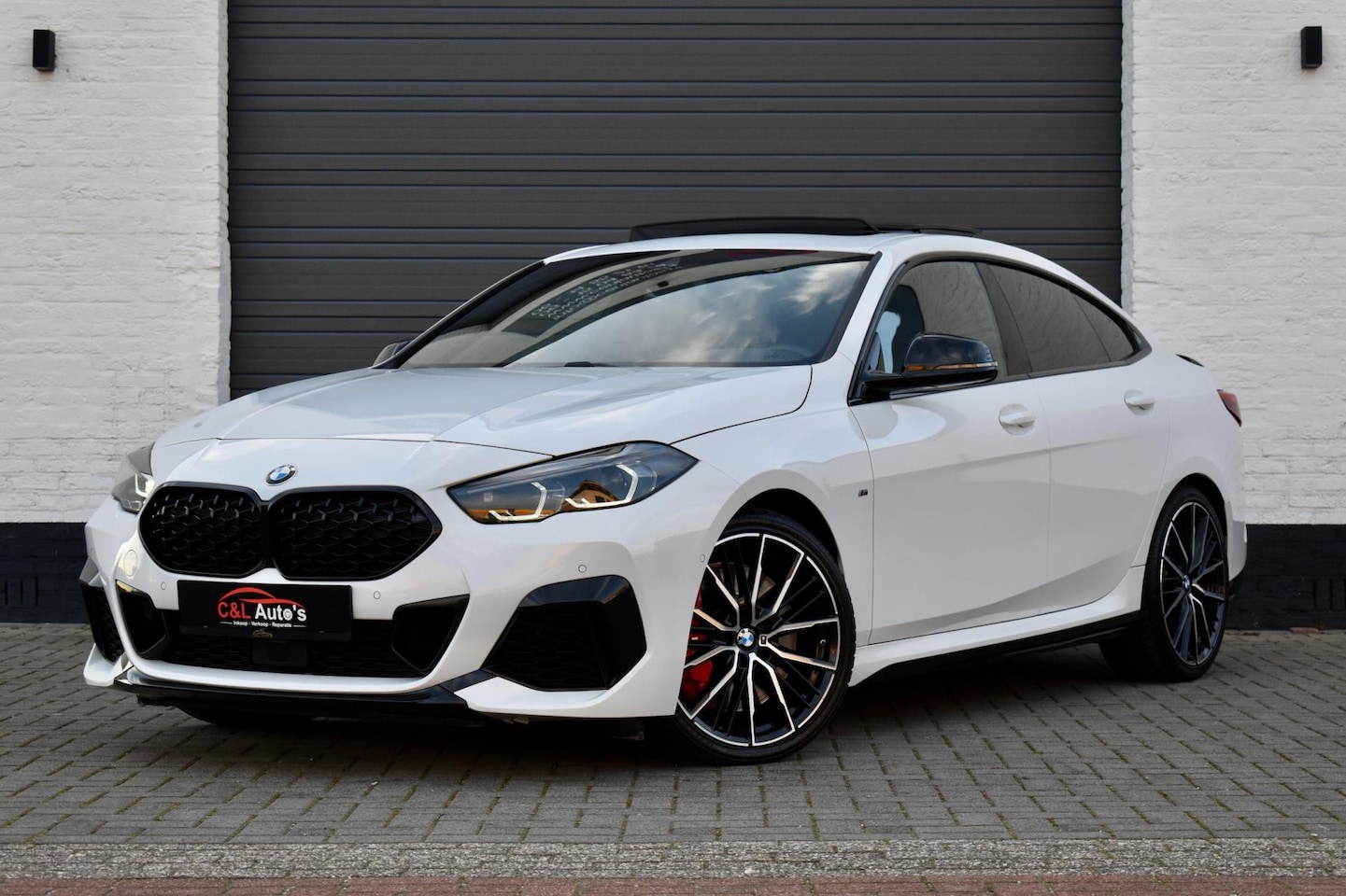 BMW 2-serie Gran Coupé - M235i xDrive | Panodak | Schaalstoelen | ACC | - AutoWereld.nl