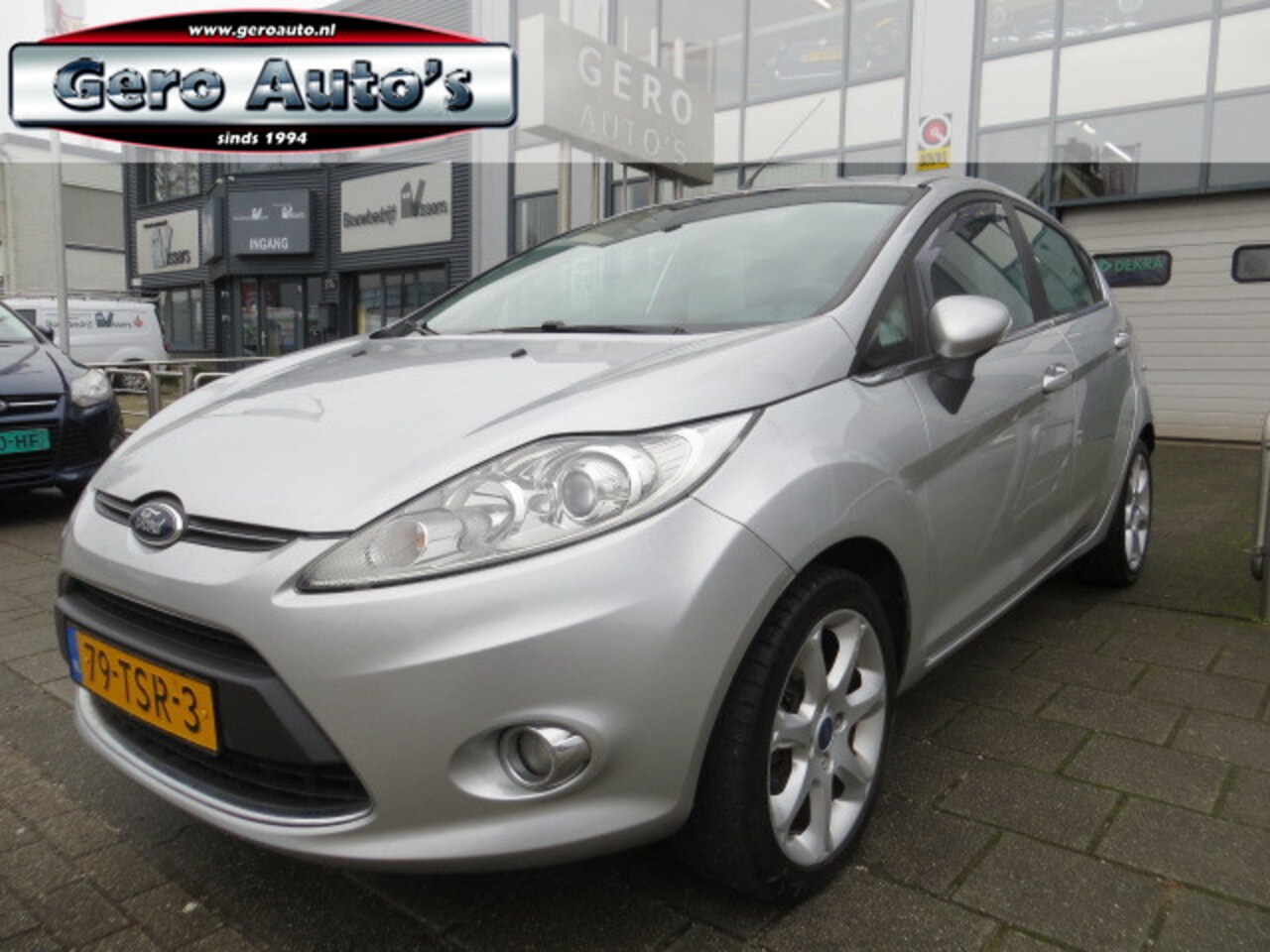 Ford Fiesta - 1.25 Titanium 5drs leder ,airco ecc,pdc 16 inch etc - AutoWereld.nl