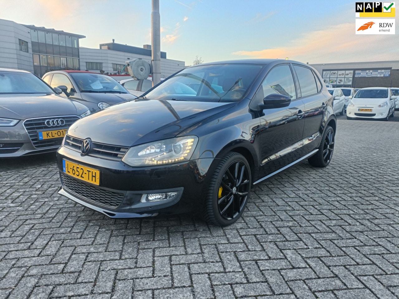 Volkswagen Polo - 1.2 AUTOMAT/NAVI/CRUISCONT/ - AutoWereld.nl