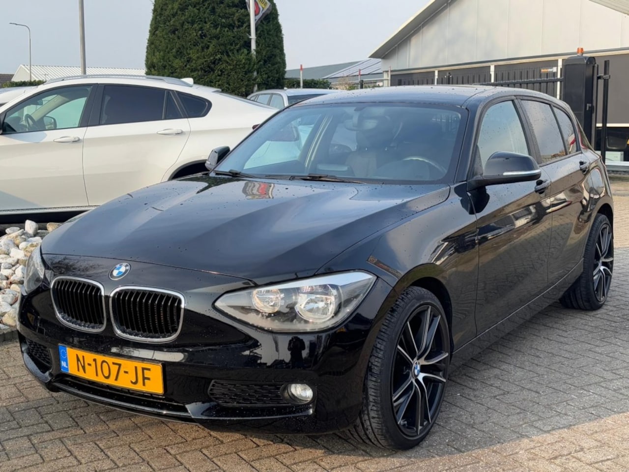 BMW 1-serie - 116I Benzine 5-Deurs 2014 Black Edition - AutoWereld.nl