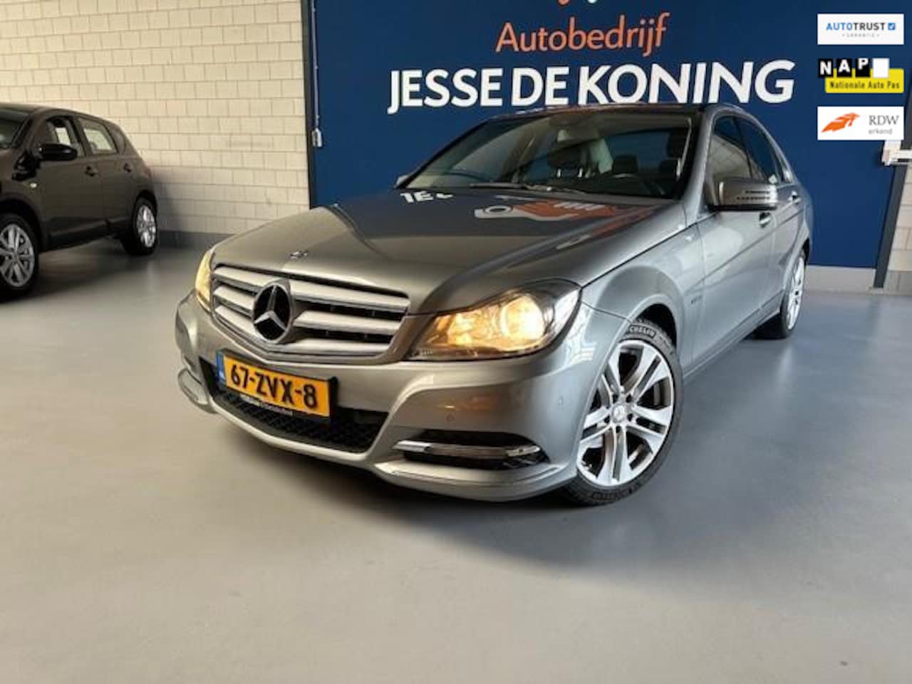 Mercedes-Benz C-klasse - 180 Business Class 125! Avantgarde 180 Business Class 125! Avantgarde,bj.2013,grijs,leder,climate,navigatie,APK 02/2025 ,NAP - AutoWereld.nl