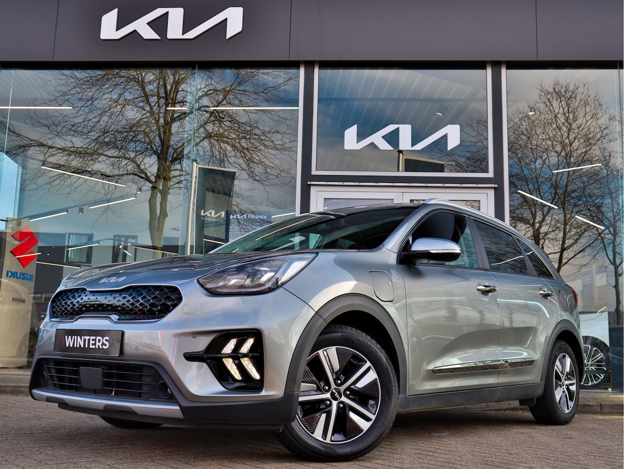 Kia Niro - 1.6 GDi PHEV Plug-In-Hybrid ExecutiveLine Pano+Leder+stoelvent.-verw.+Navi+Cam+Memory - AutoWereld.nl