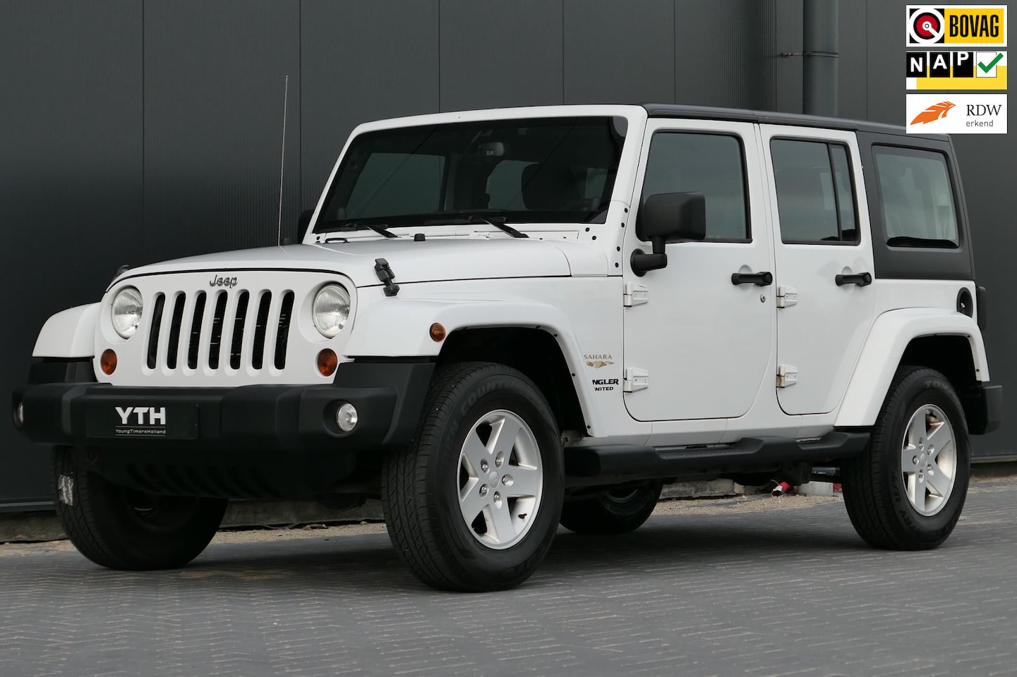 Jeep Wrangler Unlimited - 3.6 Sahara Freedomtop Softtop Airco Trekhaak Alpine - AutoWereld.nl