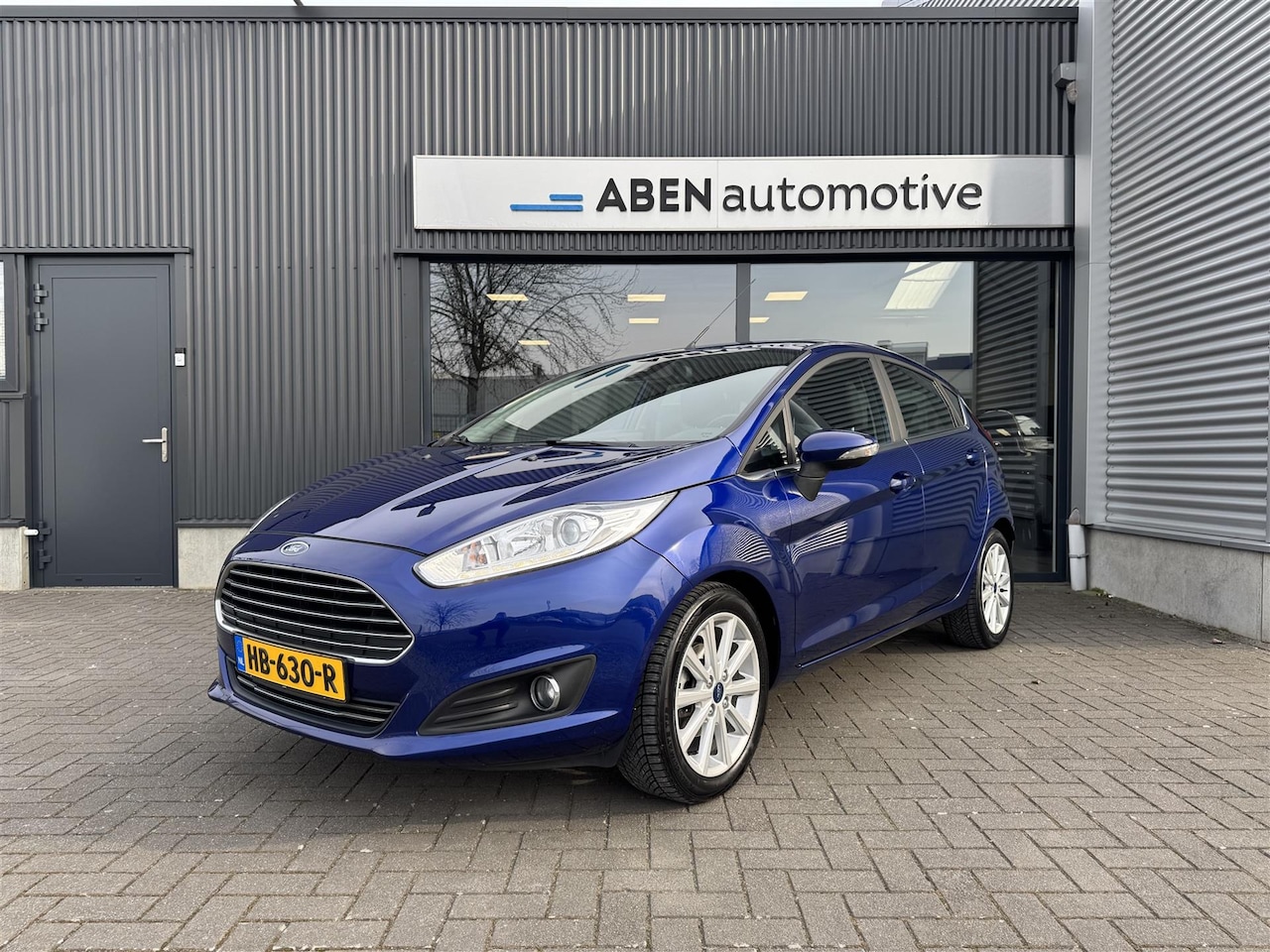 Ford Fiesta - 1.0 EcoBoost Titanium 1.0 Ecoboost 100PK Titanium 5-deurs (NAVI|PDC|4-SEIZ.|CRUISE) - AutoWereld.nl