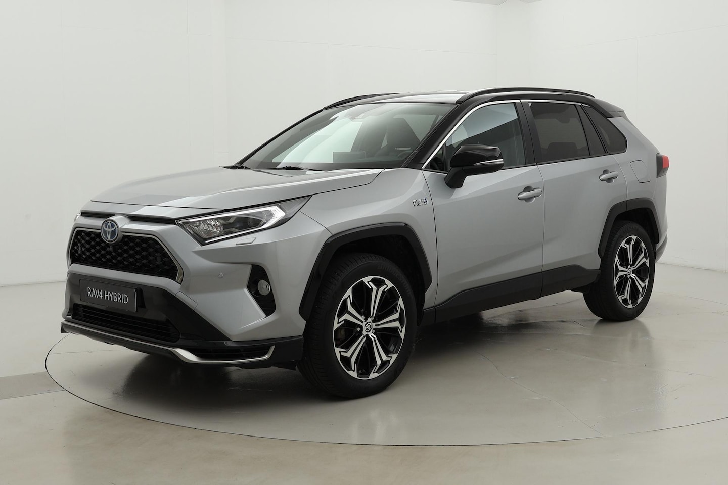 Toyota RAV4 - 2.5 Plug-in Hybrid AWD Bi-Tone Plus | Trekhaak | 360 camera | Leder - AutoWereld.nl