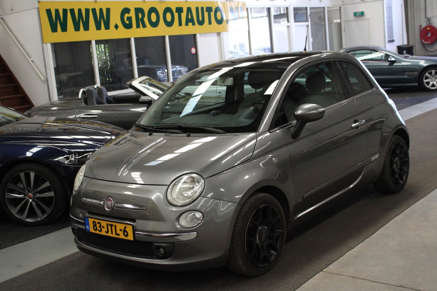 Fiat 500 - 1.2 Lounge Automaat OPKNAPPER Panoramdak, Airco, Isofix, Stuurbekrachtiging - AutoWereld.nl