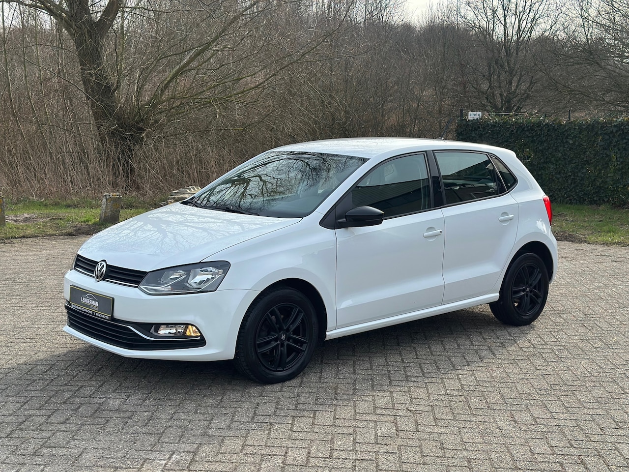 Volkswagen Polo - 1.2 TSI Comfortline FACELIFT I 90 PK I SPORTIEF I 07/26 APK - AutoWereld.nl