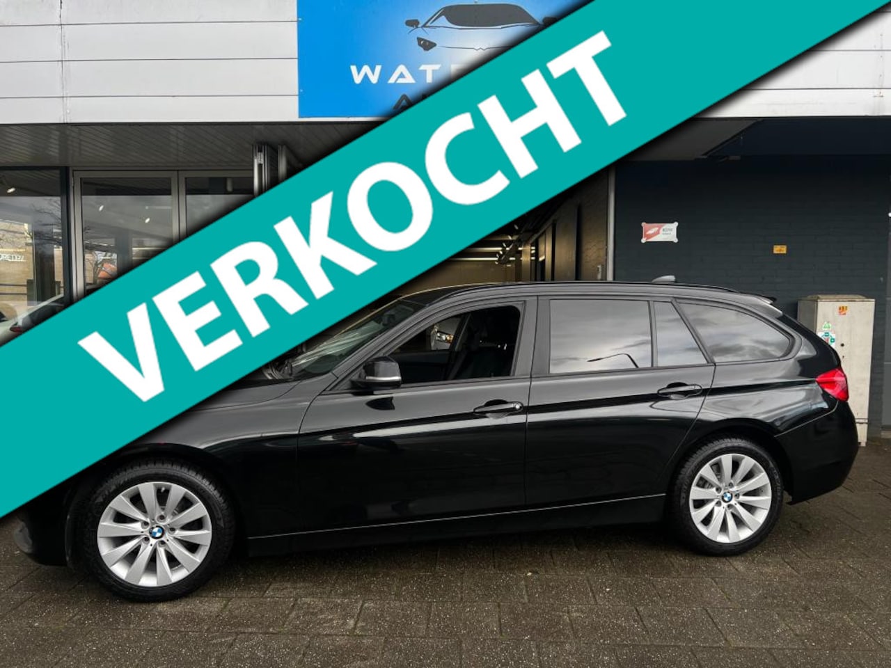 BMW 3-serie Touring - 318i Executive Touring Automaat / Leer/Navi/PDC - AutoWereld.nl