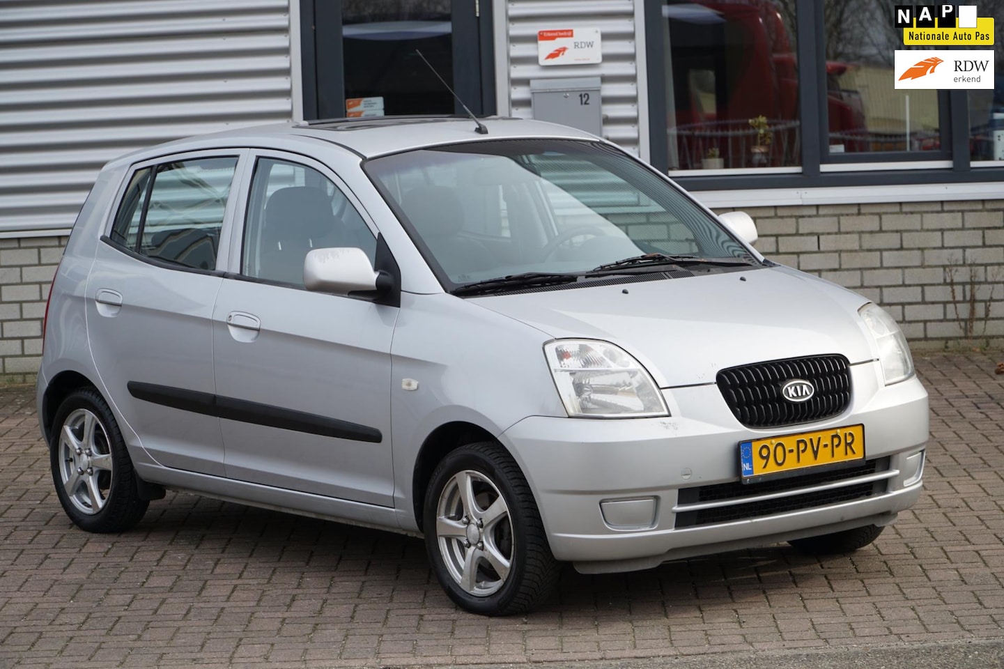 Kia Picanto - 1.1 LXE SCHUIF/KANTELDAK TREKHAAK - AutoWereld.nl