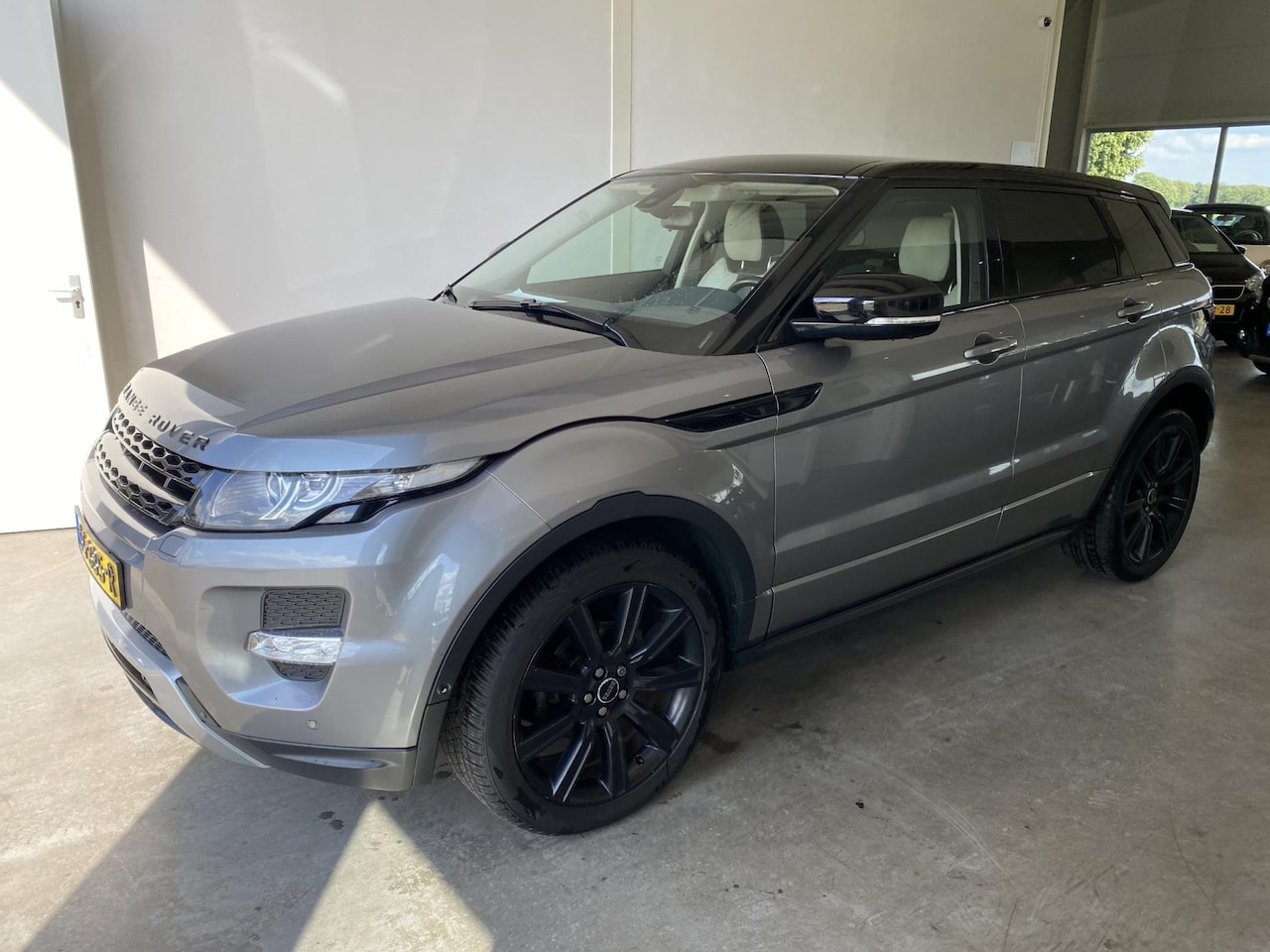 Land Rover Range Rover Evoque - 2.0 Si 4WD Prestige 2.0 Si 4WD Prestige - AutoWereld.nl