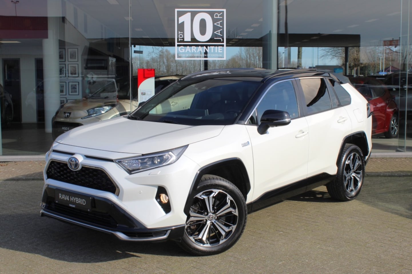 Toyota RAV4 - 2.5 Plug-In Hybrid Bi-Tone Plus | JBL | Head-Up Display | Leder - AutoWereld.nl