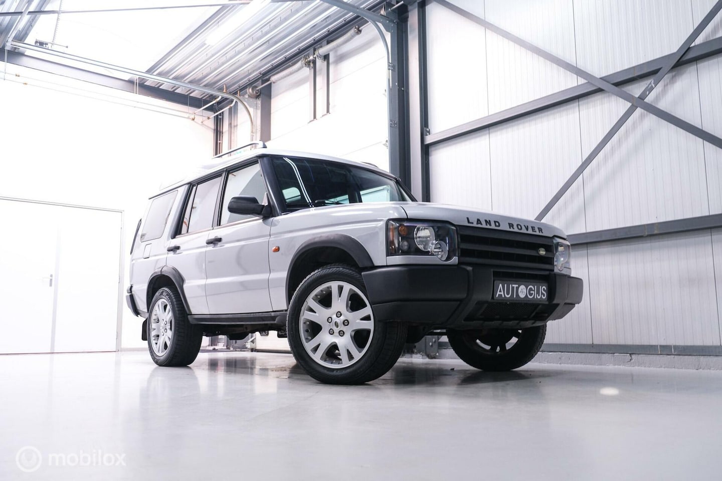 Land Rover Discovery - 4.0 V8 HSE | 7 persoons | youngtimer | Leder | Trekhaak | - AutoWereld.nl