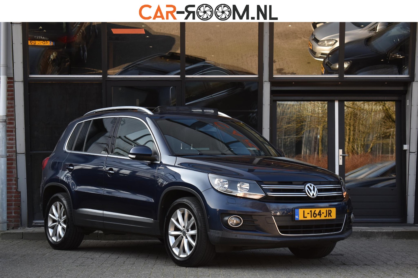 Volkswagen Tiguan - 1.4 TSI R-Line Edition Lounge Pano DSG Camera Stoel.vw - AutoWereld.nl