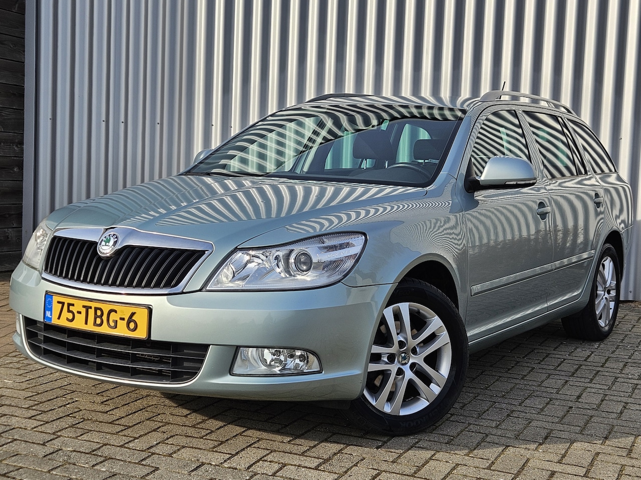 Skoda Octavia Combi - 1.2 TSI /Cruise/Navi/PDC/LMV/Clima! - AutoWereld.nl