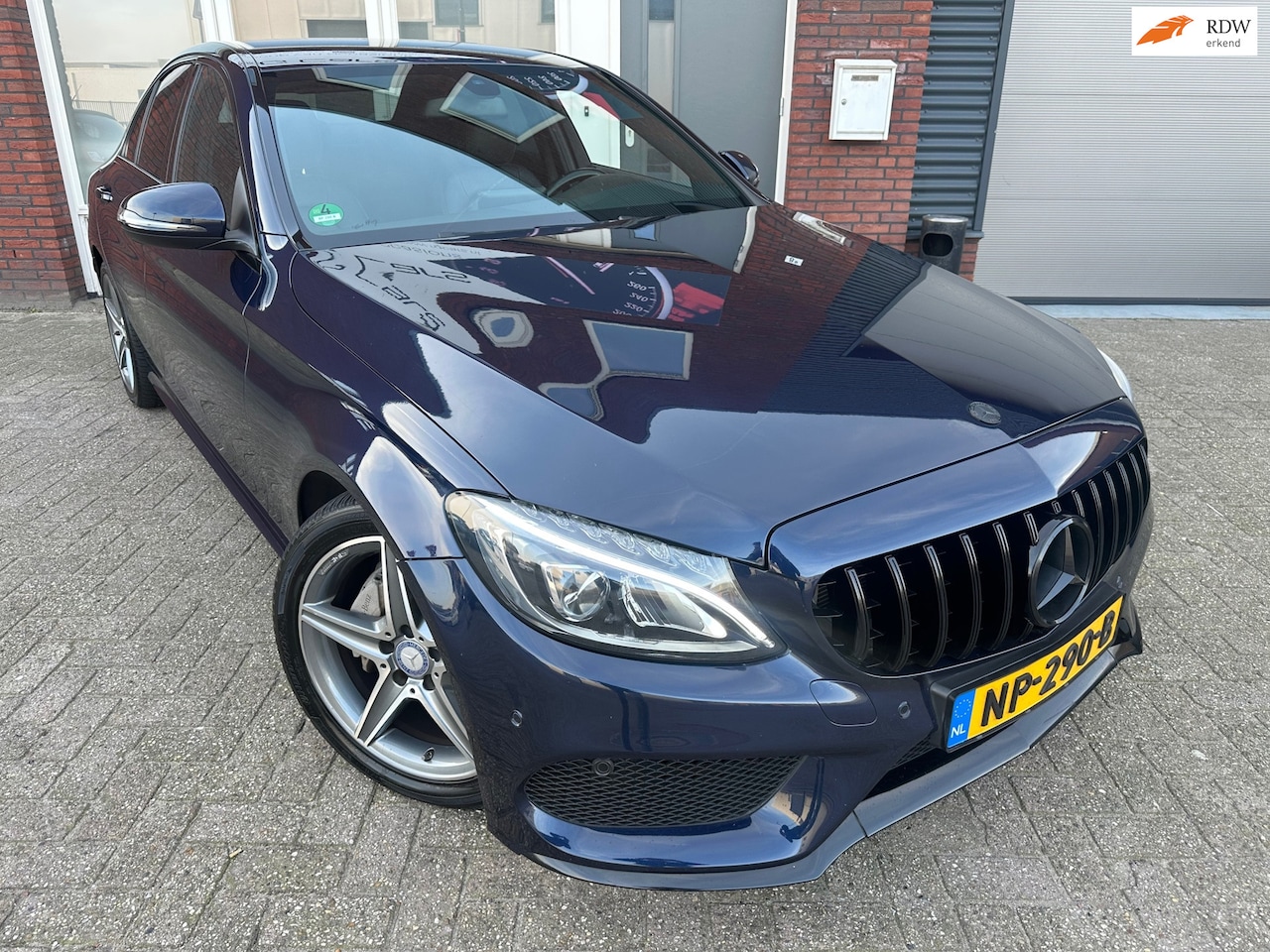 Mercedes-Benz C-klasse - 180 AMG Sport Edition / Navi / Leder / PDC / Cruise - AutoWereld.nl