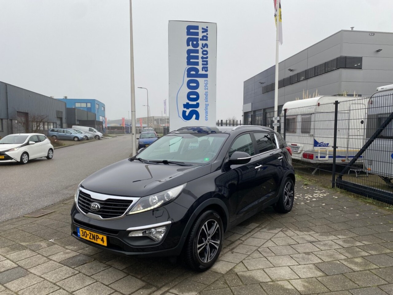 Kia Sportage - 1.6 GDI Super Pack Pano Leder+Stv. Clima Cruise Camera - AutoWereld.nl