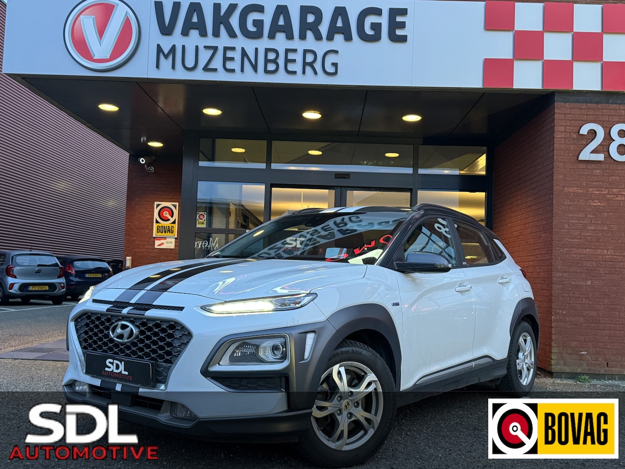 Hyundai Kona - 1.6 GDI HEV Premium // LEDEREN BEKLEDING // NAVI // CAMERA // ADAPTIVE CRUISE // - AutoWereld.nl