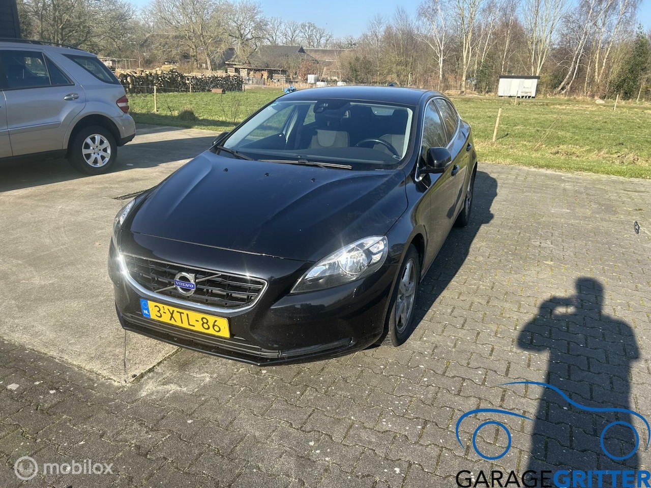 Volvo V40 - 2.0 D4 Summum Business 2.0 D4 Summum Business - AutoWereld.nl