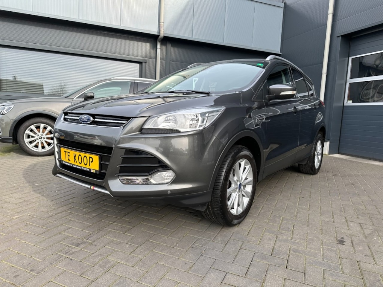 Ford Kuga - 1.5i Titanium Navigatie - AutoWereld.nl