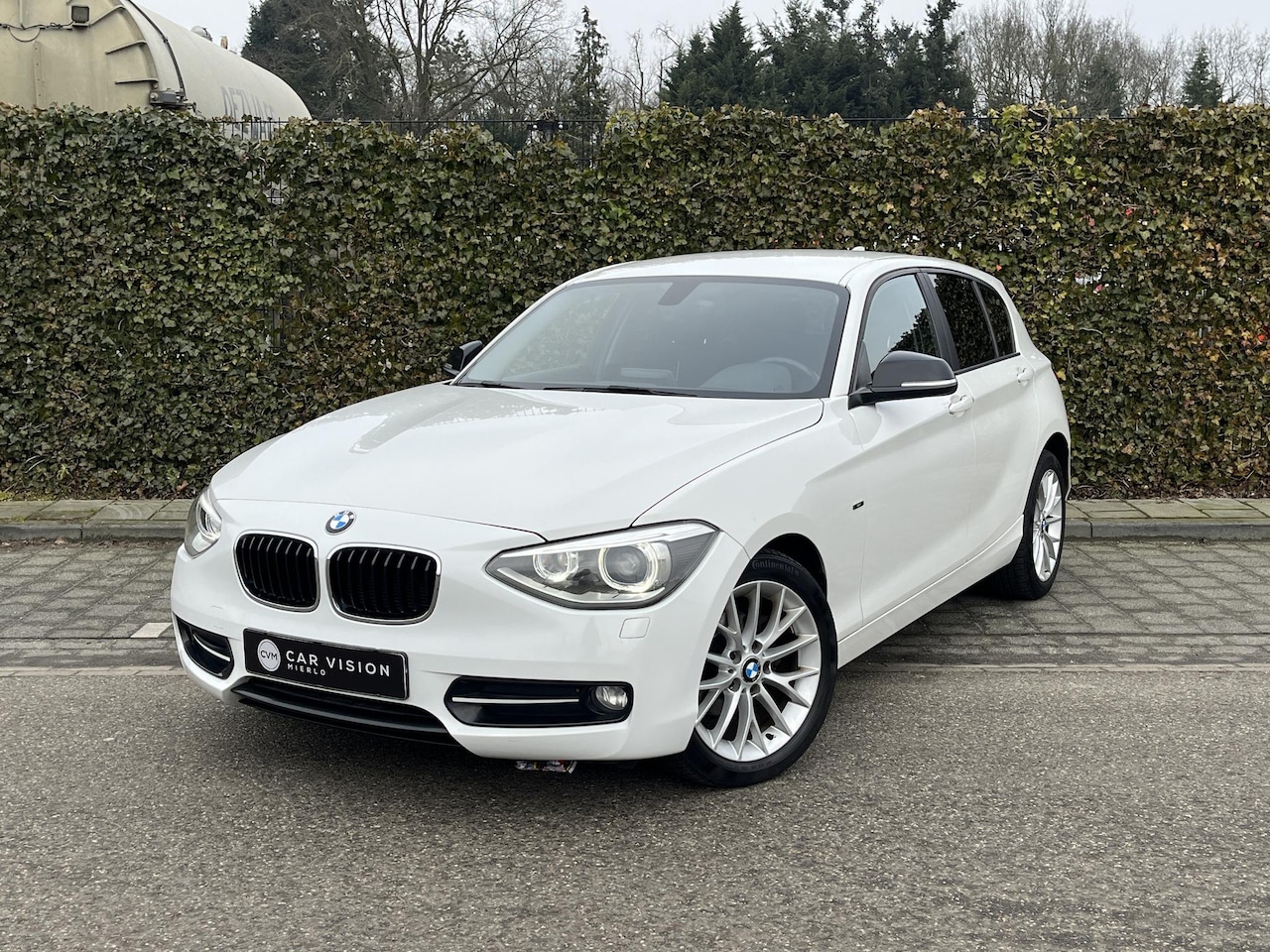 BMW 1-serie - 116i Business Sport * Navi * Xenon * Aut * Garantie - AutoWereld.nl