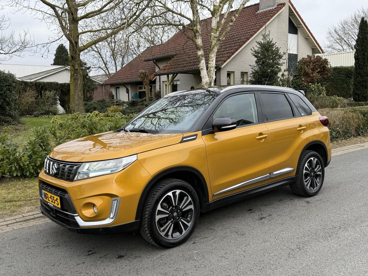 Suzuki Vitara - 1.5 Hybrid Style Automaat•Leder•Pano - AutoWereld.nl