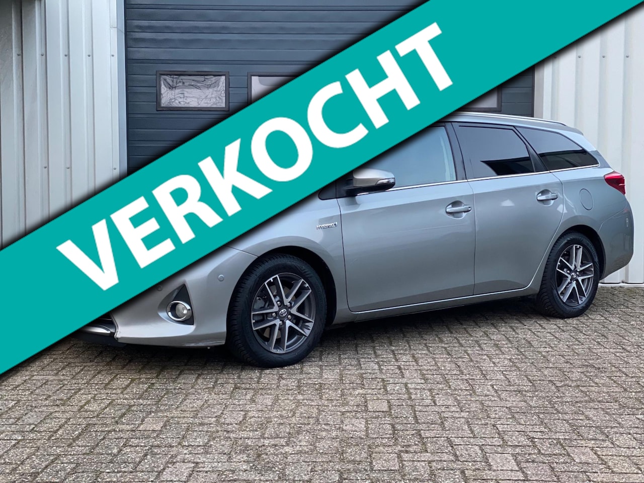 Toyota Auris Touring Sports - 1.8 Hybrid Lease 2e EIG / NAVI - AutoWereld.nl