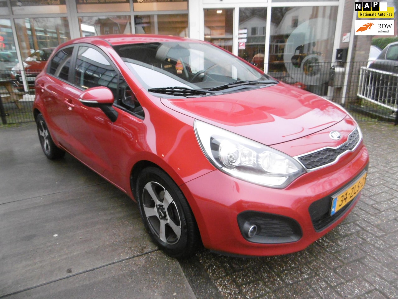 Kia Rio - 1.2 CVVT 86pk 5-deurs Airco Cruise Trekhaak LED Zuinig A-label - AutoWereld.nl