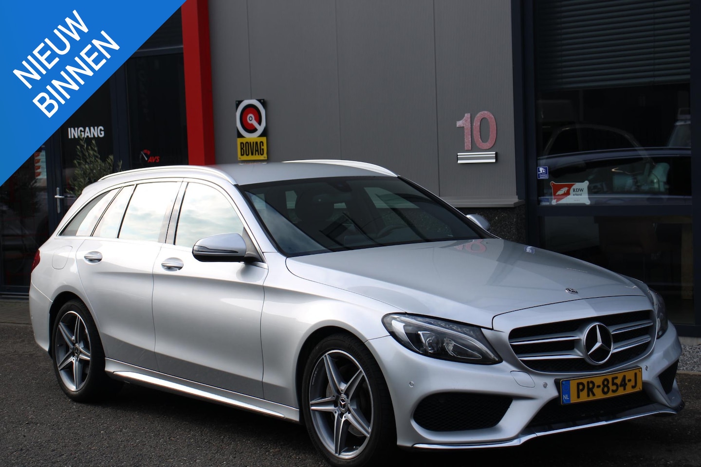 Mercedes-Benz C-klasse Estate - 180 Business Solution Plus Upgrade Edition AMG, LEER, NAVI - AutoWereld.nl