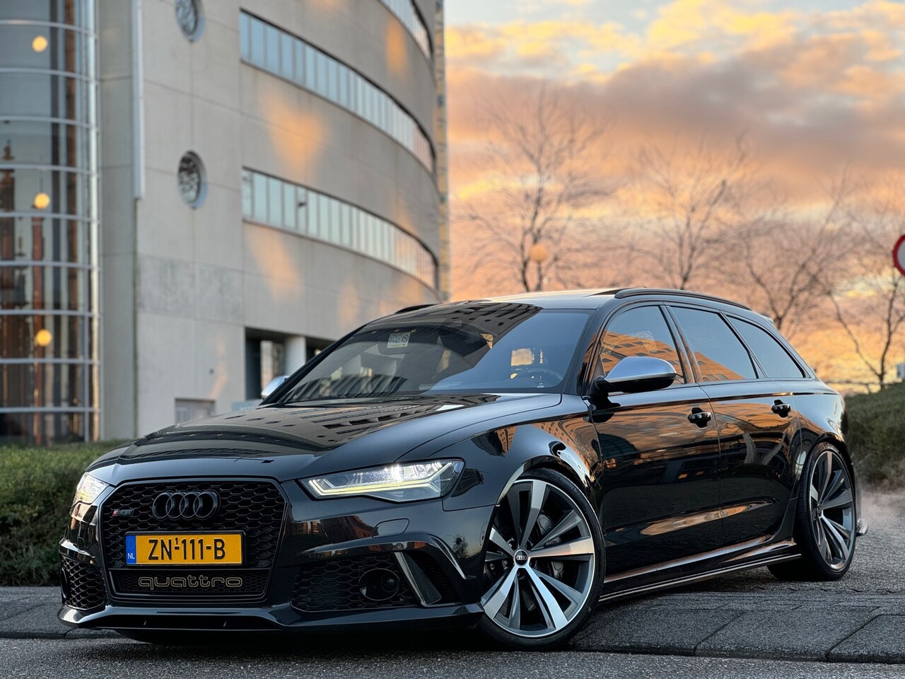 Audi RS6 - 4.0 TFSI V8 EXCLUSIVE B&O.Carbon.Pano.21''AKRAPOVIC - AutoWereld.nl