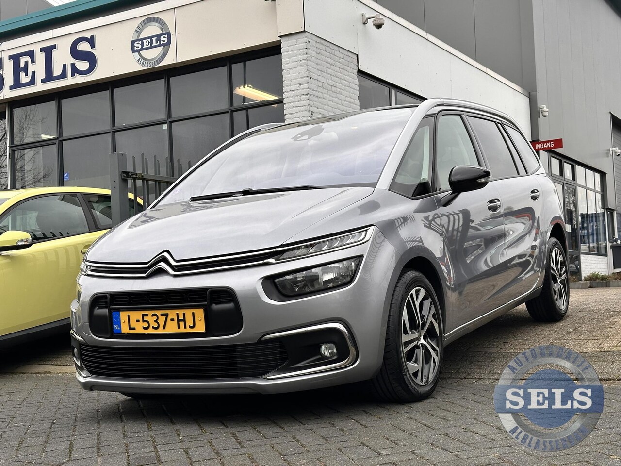 Citroën Grand C4 SpaceTourer - 1.2 PureTech Business AUT/NAVI/PDC/TREKHAAK/7PERSOONS - AutoWereld.nl