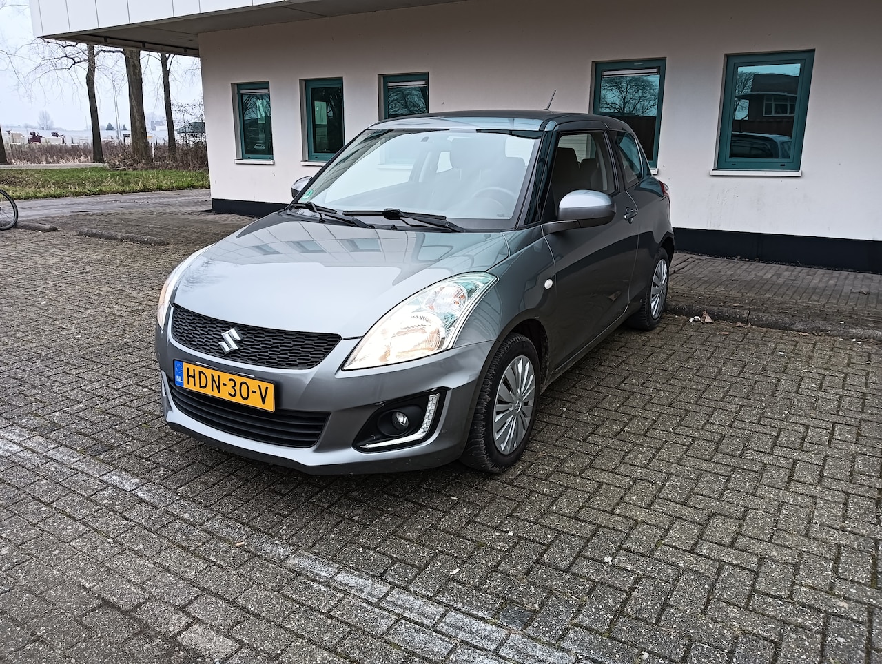 Suzuki Swift - 1.2 Comfort EASSS AIRCO. Cruise control . Topstaat - AutoWereld.nl