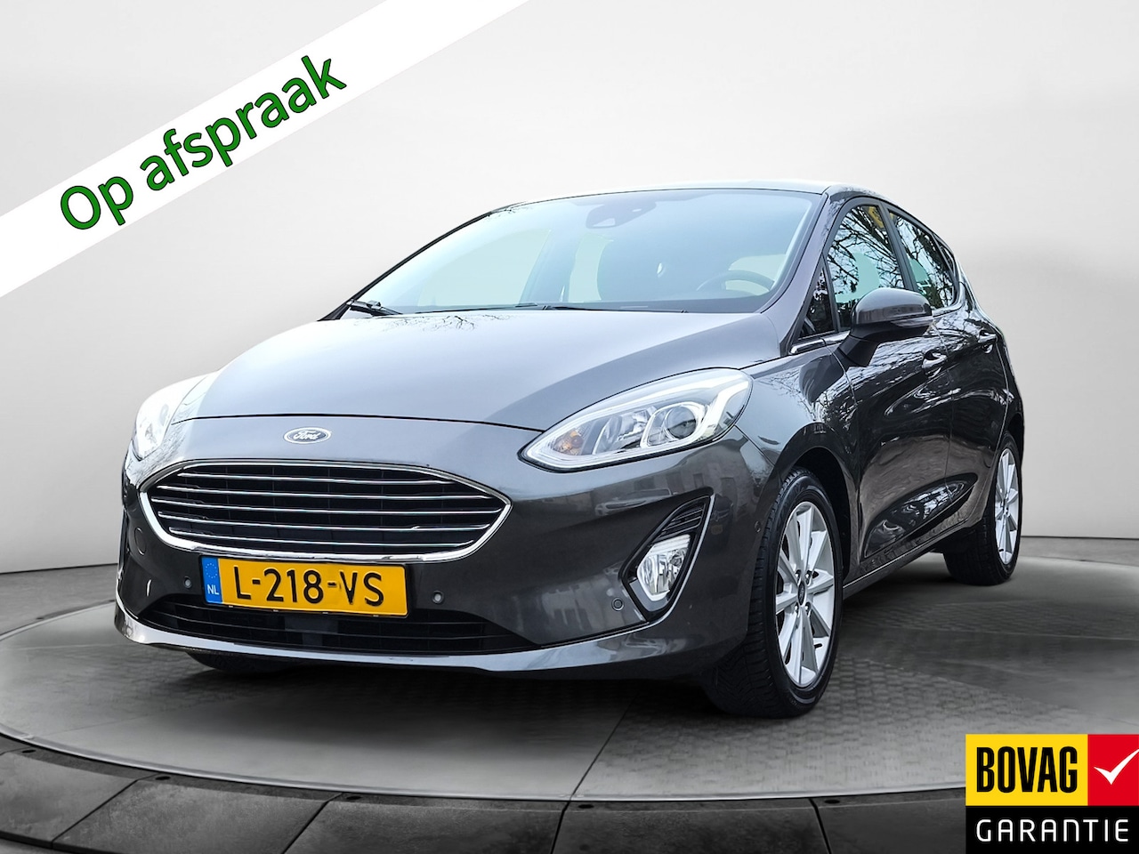 Ford Fiesta - 1.0 EcoBoost Titanium (100 PK) 1e-Eig. Ford-Dealer-Onderh. BOVAG-Garantie. Navigatie/Apple - AutoWereld.nl